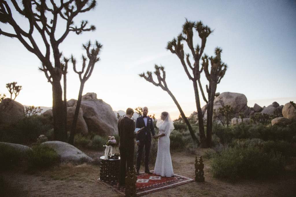 A ceremony of a micro wedding and elopement in Joshua tree