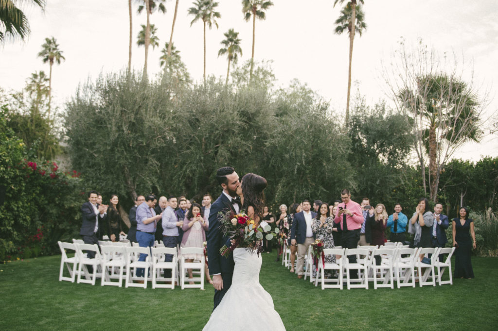 newly wedding couple kissing after wedding at the Parker, Palm Springs