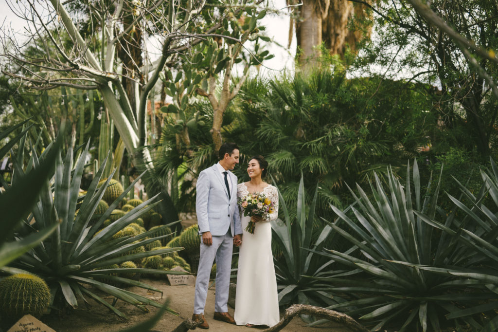 bride and groom at Moorten Botanical garden