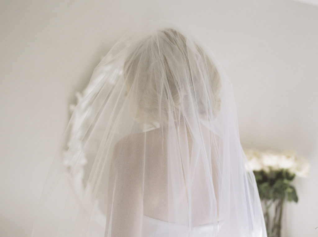 Portrait of the bride from behind, shot on Kodak film
