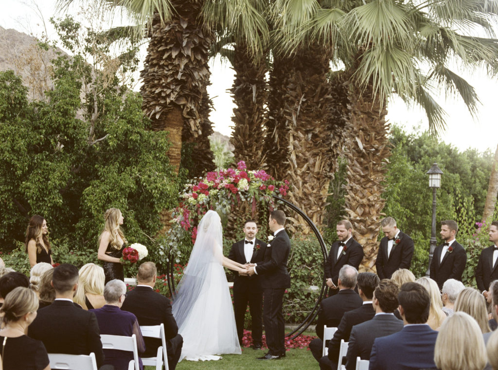 Film photo the bride and groom during their ceremony in Palm Springs, California. 