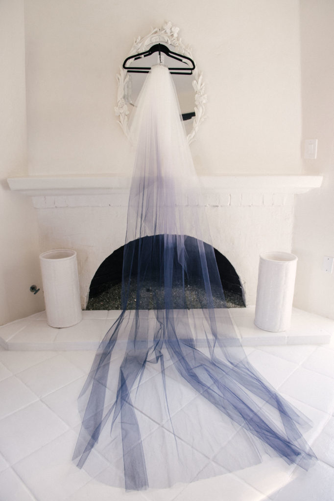 Long veil that is dyed ombre from black to white. 